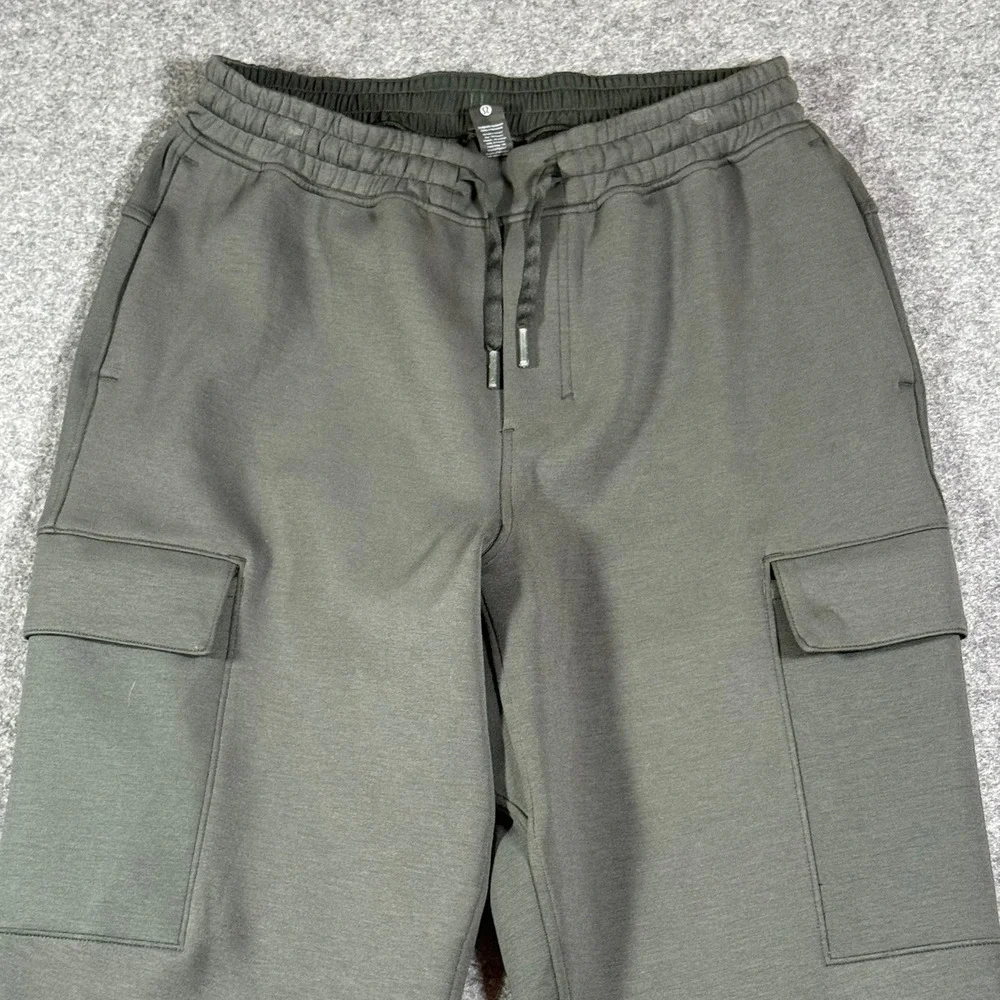 Lululemon Smooth Space Cargo Jogger Pants Dark Olive Green Mens Size M Lounge